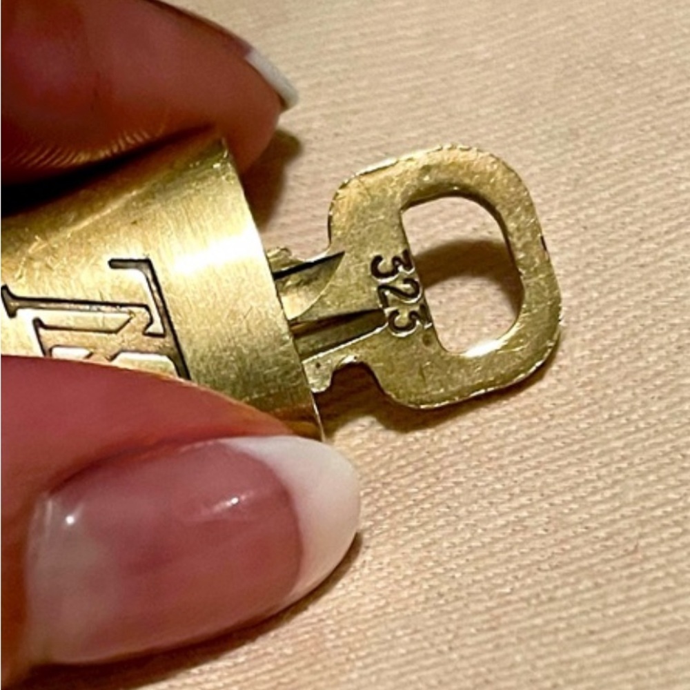 Auth Louis Vuitton Lock/Key plus unbranded chain